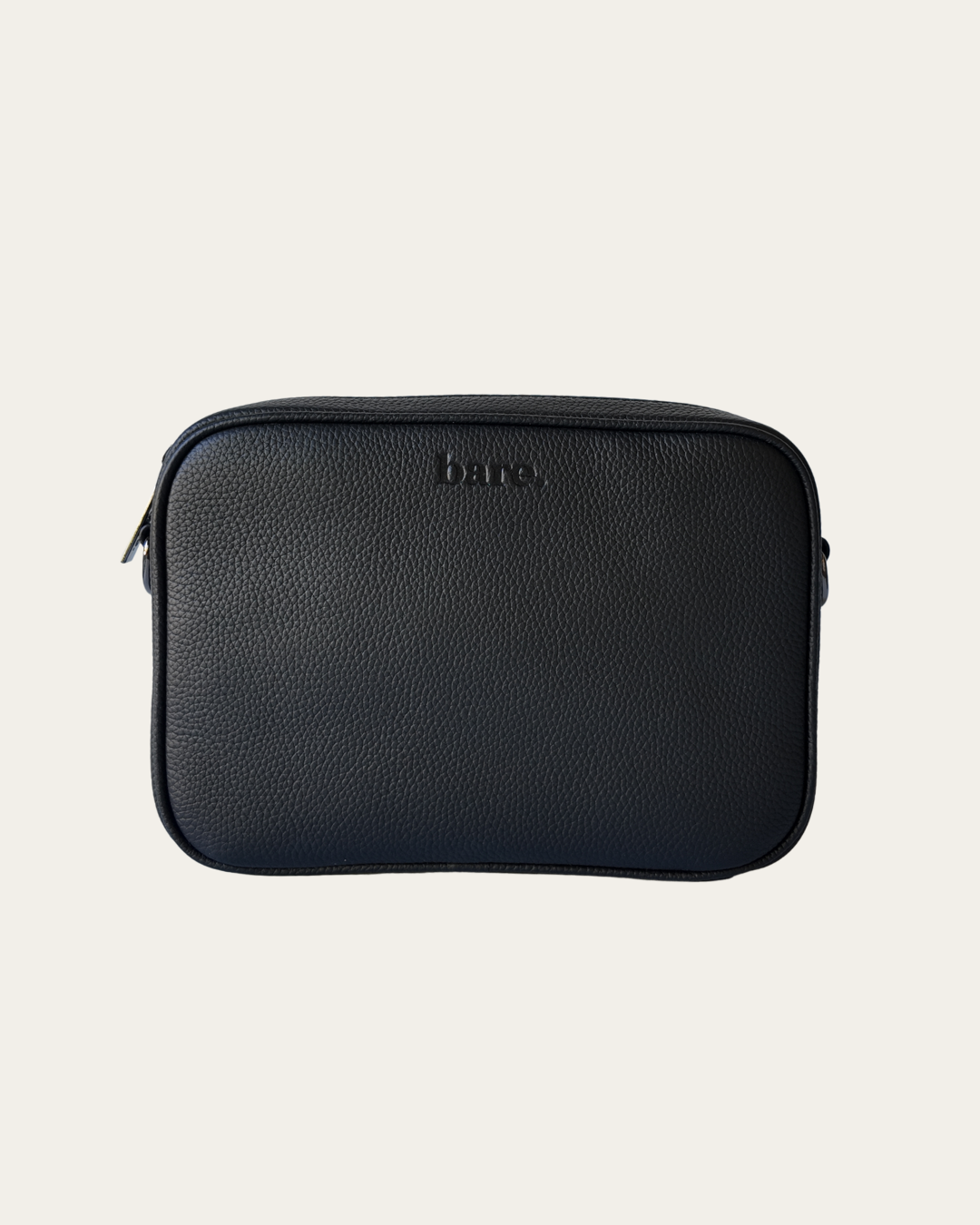Esme Bag Black Bare leather with 'bare' branding on a beige background