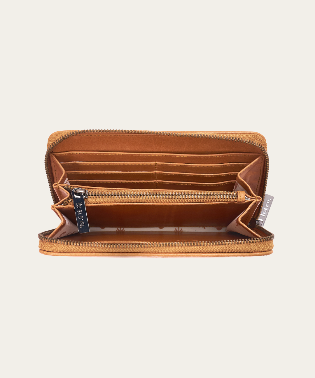 Image of an open Bare Leather Quinn wallet in Camel. Image shows the inside features of the wallet.