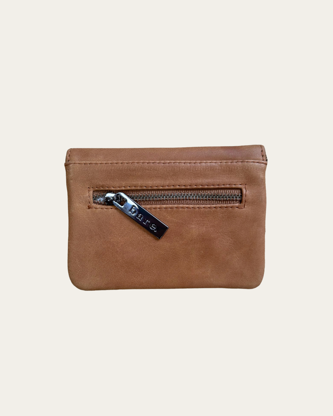 Camel leather coin purse with magnetic closure and zip pocket. Back