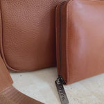 Video showing the details and functionality of the Camel Bare Leather Quinn wallet