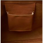 Image show the inside pocket of the Camel Bare Leather Lulu bag