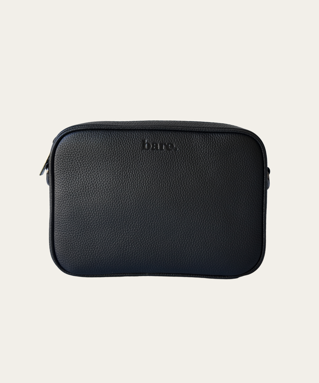 Esme Bag Black Bare leather with 'bare' branding on a beige background