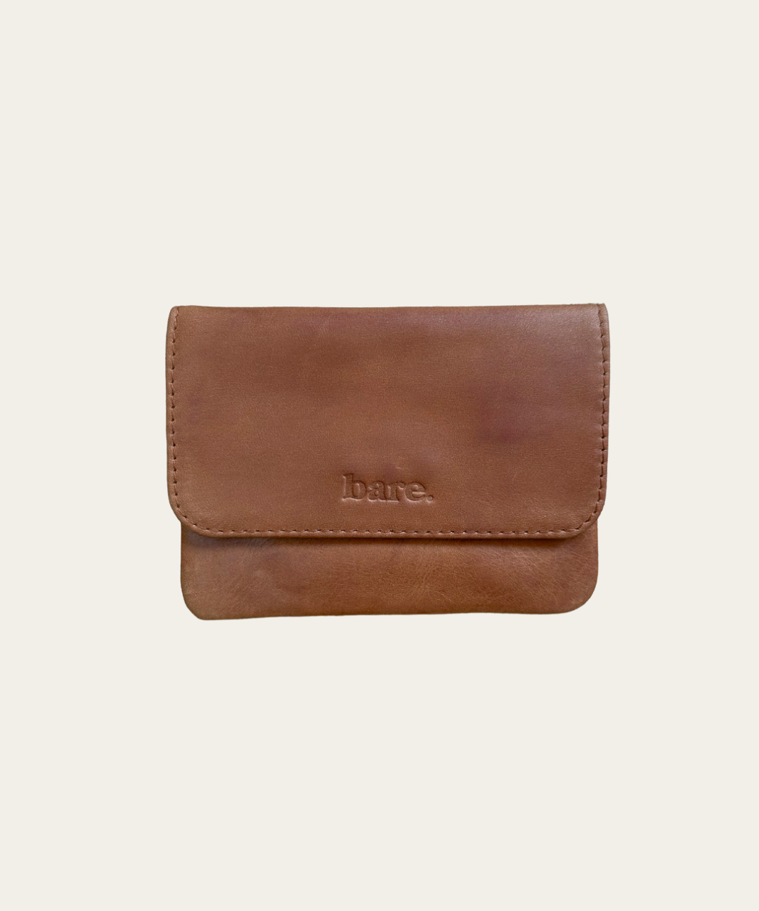 Camel leather coin purse with magnetic closure and zip pocket. Front